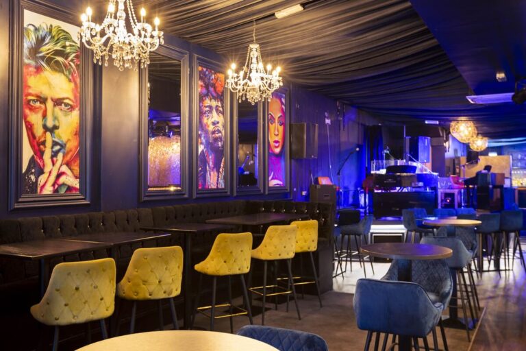 Stylish event venue in Reading featuring lounge seating and music portraits